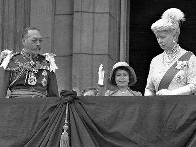 Britain's Queen Elizabeth II, then Princess Elizabeth, centre, waves as she stands on the balcony of Buckingham Palace, London, with her grandparents King George V and Queen Mary, in this May 6, 1935 photo. Princess Margaret is just visible over the balcony edge. The balcony appearance is the centerpiece of almost all royal celebrations in Britain, a chance for the public to catch a glimpse of the family assembled for a grand photo to mark weddings, coronations and jubilees.