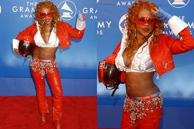And the most insane Grammys look of all time goes to Lil Kim, who managed to wear leather pants, lace-up boots, a bejewelled belt, velour biker gloves, Chanel boxers and fifty shades of red on the red carpet. <br/>