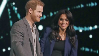 Prince Harry joined by Meghan on stage at the end of his speech at WE Day UK in March 6, 2019. 