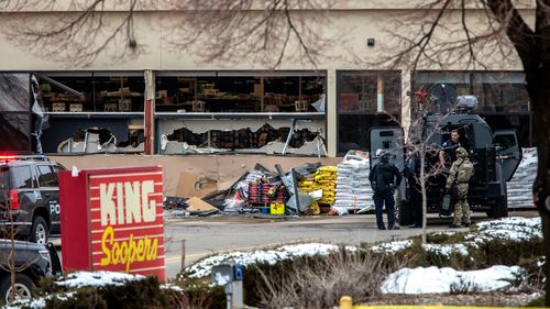 Tactical police units respond to the Boulder grocery store.