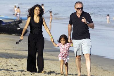 With husband Francois Henri Pinault and daughter Valentina in Malibu for the 4th of July weekend
