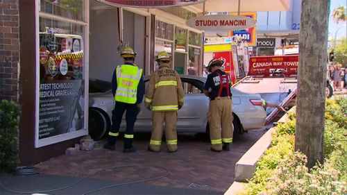 The car crashed into a hair and laser therapy salon. (9NEWS)