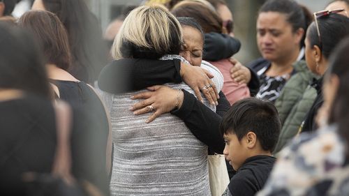 A blessing was held and songs performed while families waited for news from the operation.