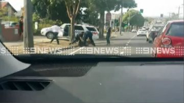 Man arrested outside of a Geelong school. (9NEWS)
