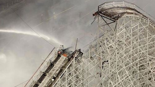 Iconic wooden roller coaster collapses after fire at California theme park