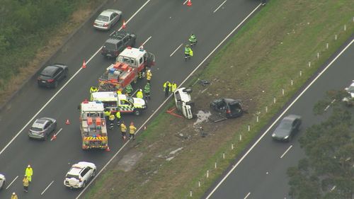 A father and son have been killed in a "very traumatic" highway crash this morning on the NSW Central Coast.