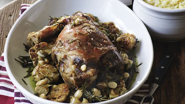 Slow-roasted leg of lamb with garlic and root vegetable mash