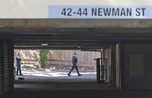 Police attend a block of units at 42-44 Newman Street, Merrylands, where a 44-year-old man died from a gunshot wound early Saturday morning.