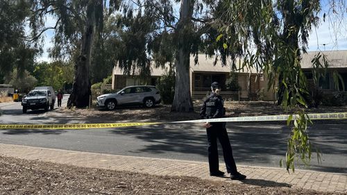 Police investigating after woman's body found at Adelaide unit block