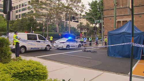 Sydney food delivery cyclist dies after being struck by truck in Redfern