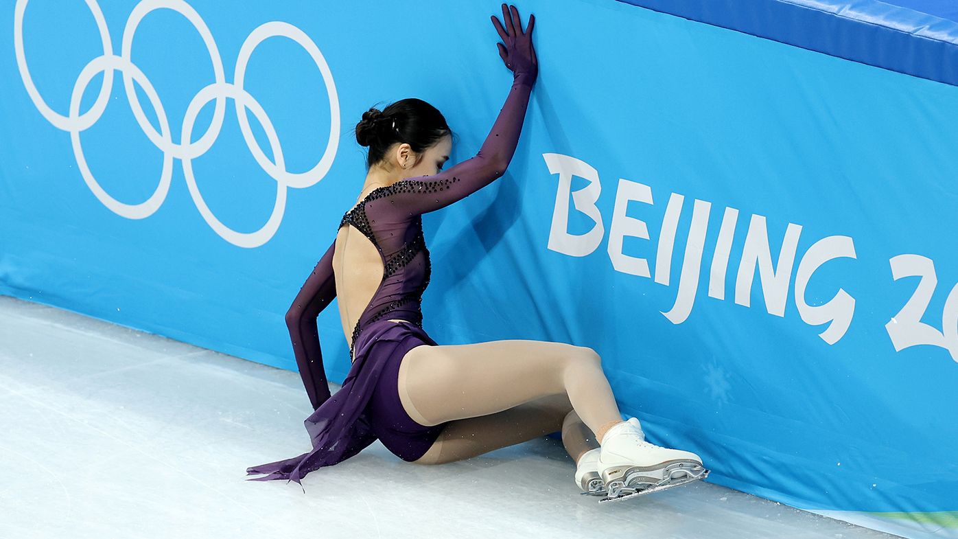 Yi Zhu of Team China falls during the Women Single Skating Short Program Team Event on day two of the Beijing 2022 Winter Olympic Games.