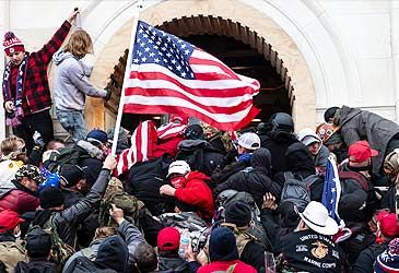 Rioters stormed the US Capitol in January 2021 to stop what process?