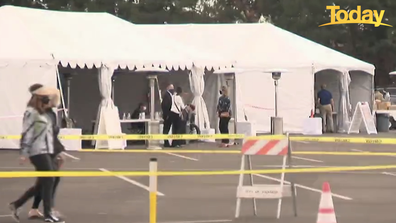 After being processed, residents are taken to a white tent where they are given a once-over before the vaccination.