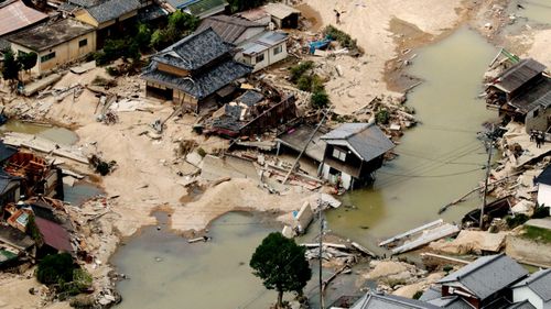 An area of Kurashiki, Okayama prefecture, hit by flooding following torrential rain. (Photo: AP).