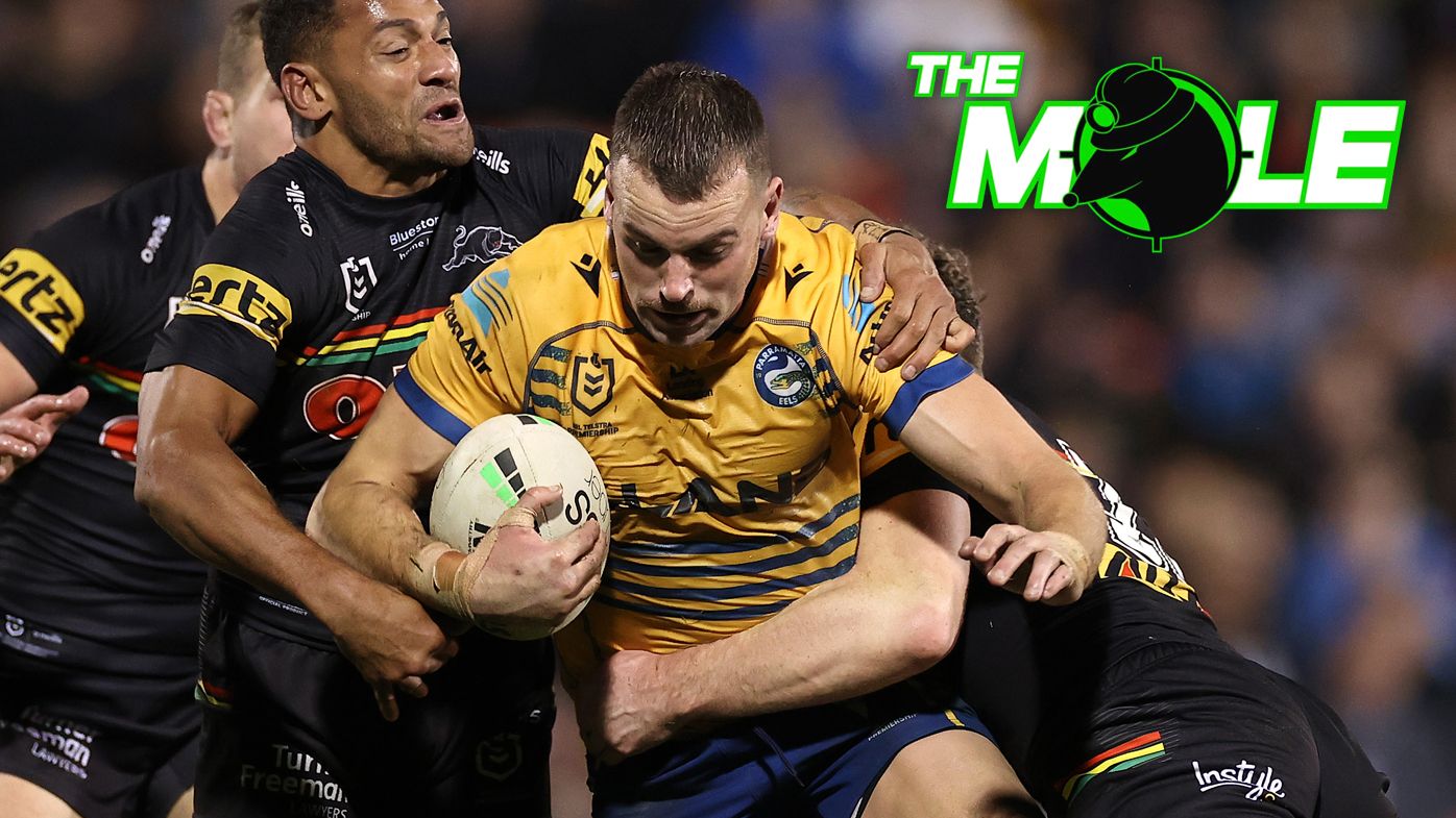 Parramatta&#x27;s Clint Gutherson tries to evade a Penrith tackle.