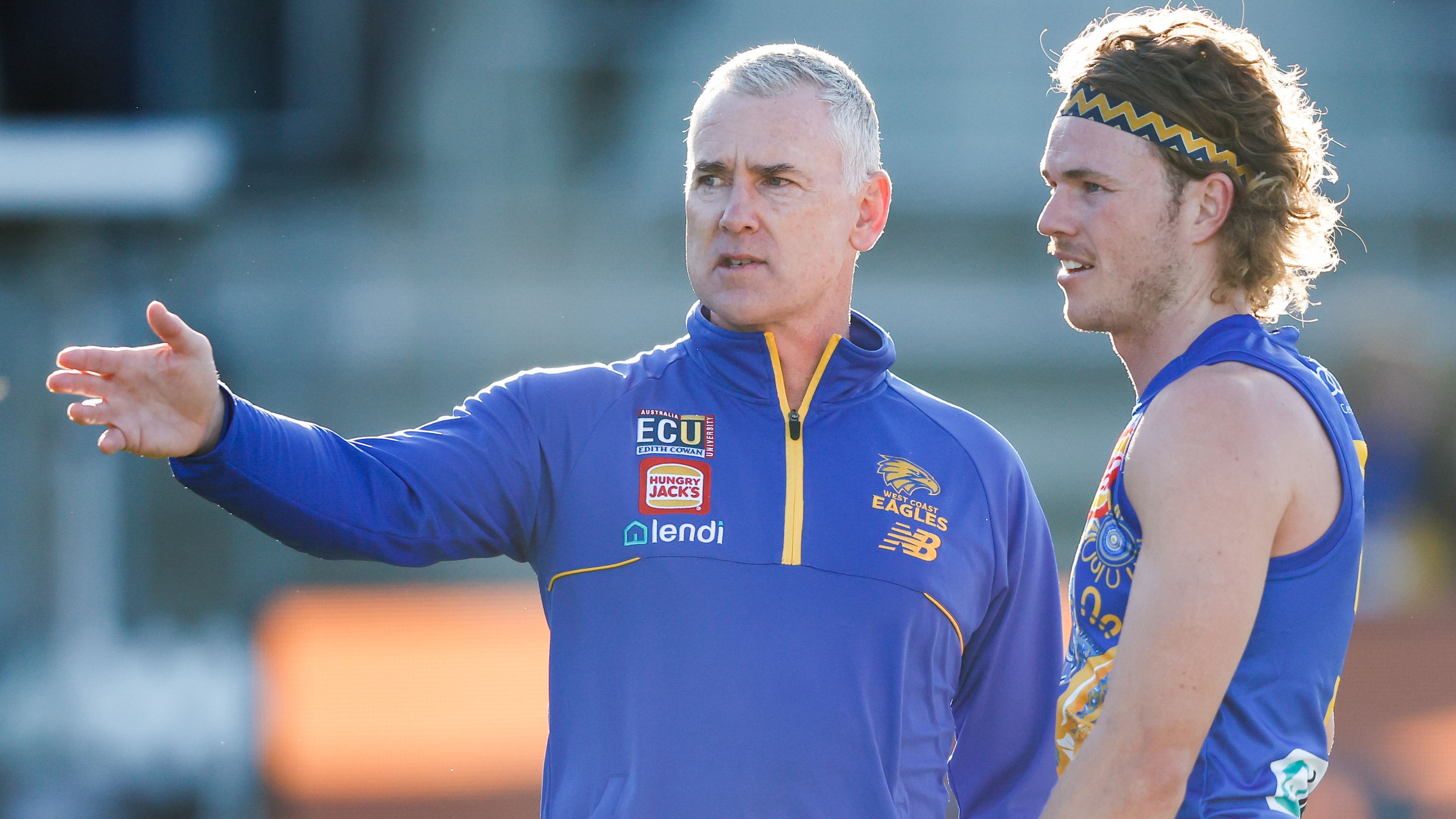 LAUNCESTON, AUSTRALIA - MAY 21: Adam Simpson, Senior Coach of the Eagles chats with Jayden Hunt of the Eagles during the 2023 AFL Round 10 match between the Hawthorn Hawks and the West Coast Eagles at UTAS Stadium on May 21, 2023 in Launceston, Australia. (Photo by Dylan Burns/AFL Photos)