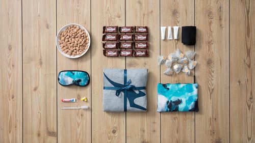 Items included in the pack are the iconic business class pyjamas, business class amenity kits featuring ASPAR skin products, as well as Tim Tams and snacks that would normally be offered to passengers travelling in premium cabins.