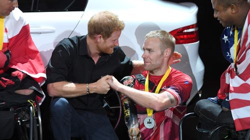 Harry congratulates Omrod. (Getty)