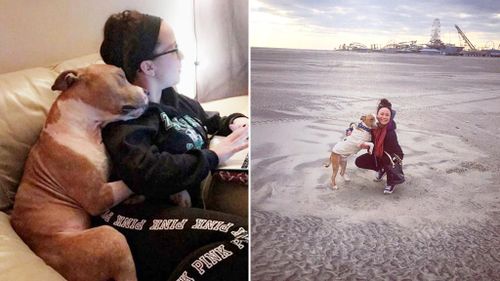 Former shelter dog pictured snuggling with new owner