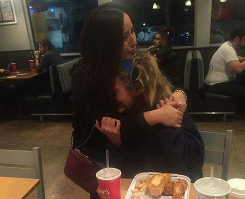 Homeless woman cries into Good Samaritan’s arms after receiving a hot meal 