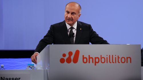 Mining giant BHP Billiton slashes dividend after posting half year net loss of AU$7.8 billion