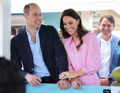 Catherine and Prince William during a visit to a Fish Fry