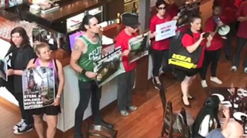 Protesters stormed the Rare Steakhouse in Melbourne's CBD. (Facebook)