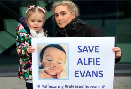 Hundreds of people were seen earlier this month outside the boy's hospital, protesting a Supreme Court decision to keep Alfie in care in the UK. Picture: AAP.