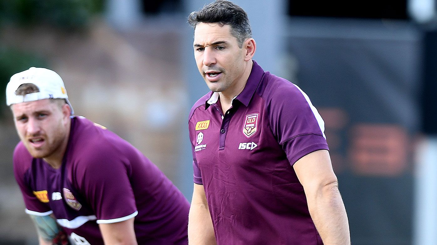 Billy Slater gives some advice to Cameron Munster during a Queensland Maroons State of Origin training session at Langlands Park on July 04, 2019