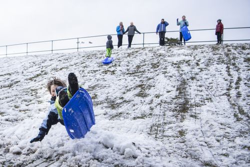 Kids making the most of the cold weather at Blackheath. Photo: Wolter Peeters / SMH