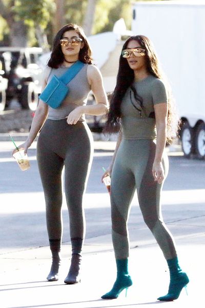 <p>Love them or loathe, the Kardashian clan are unrivalled when
it comes to making a joint sartorial statement.<br />
<br />
Case in point, an off-duty matchy-matchy look courtesy of
Kim Kardashian and little sister Kylie Jenner.<br />
<br />
The half-sisters, who share a mutual love of makeup and
rappers, took to the streets of Calabasas yesterday in twinning spandex
body-con attire, sunglasses and heeled sock boots.<br />
<br />
While Mrs West opted for a head-to-toe mossy green ensemble
with emerald-coloured sock boots, 20-year-old Kylie broke up her beige and
slate look with a bright, blue over-shoulder fanny pack.<br />
<br />
The overall effect was sporty, chic and left more to the imagination than some other looks recently debuted by the pair.</p>
<p>Click through to see Kim and Kylie&rsquo;s most iconic joint style
moments.</p>
