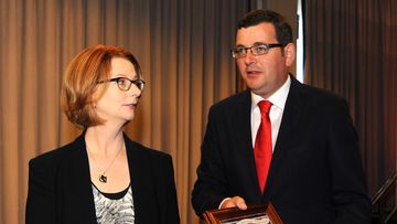 Former Prime Minister Julia Gillard and Victorian Opposition Leader Daniel Andrews together in 2013. (AAP)