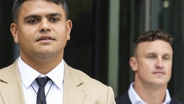 Latrell Mitchell and Jack Wighton depart ACT Magistrates Court in Canberra on Wednesday.