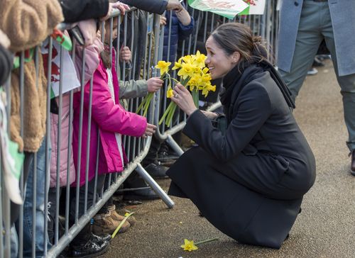 The soon-to-be royal took a moment to chat with a young fan outside the castle. (AAP)