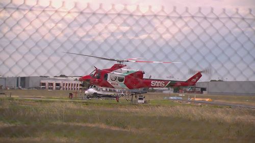 The rescue helicopter was sent from Adelaide despite challenging weather conditions.