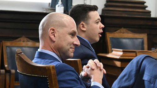 Kyle Rittenhouse (right) yawns while on trial in Kenosha, Wisconsin.