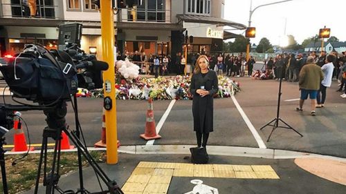 Sophie Walsh preparing for a live cross in the wake of the mass shooting.