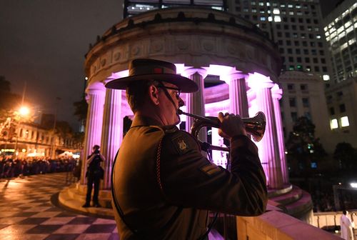 Bugler CPL Aaron Madden performs during the Anzac Day Dawn Service in Brisbane. (AAP)