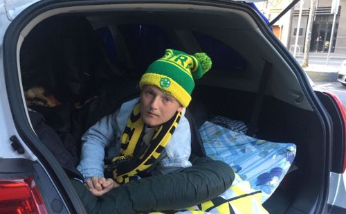 One fan slept overnight in a car while taking shifts waiting in line for tickets. 