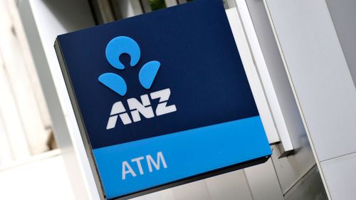 ANZ Bank cuts dividend as profit slumps 24.3%