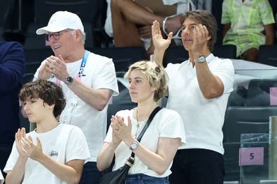  Tom Cruise (R), Greta Gerwig and David Zaslav look on as they attend the Artistic Gymnastics Women's Qualification on day two of the Olympic Games Paris 