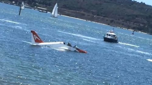 Pilot pulled from water after military jet crashes into San Diego Bay