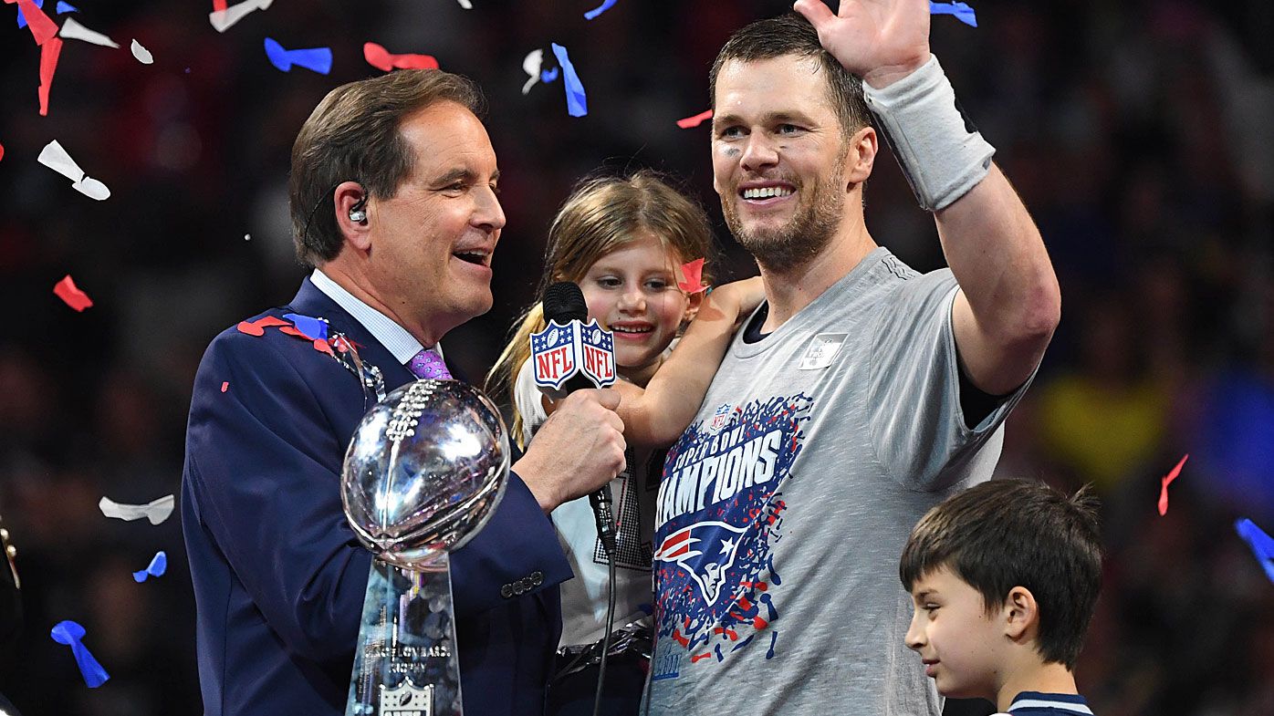 Brady celebrates with the Vince Lombardi Trophy