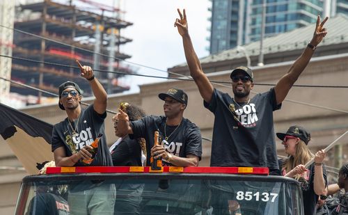 Toronto Raptors guard Malcolm Miller (L), guard Jodie Meeks (C) and forward Serge Ibaka (R) celebrate aboard an open bus during a victory parade through downtown Toronto, Canada.  EPA/WARREN 