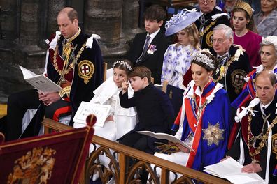 From left, 1st row, Britain's Prince William, Princess Charlotte, Prince Louis, Kate, Princess of Wales and the Prince Edward Duke of Edinburgh at the coronation ceremony of King Charles III in Westminster Abbey, London, Saturday May 6, 2023. (Yui Mok, Pool via AP)