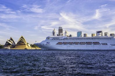 Sydney Australia - April 1, 2016: The P&O cruise ship Pacific Jewel slowly steams past the Sydney Opera House on a bright Autumn afternoon.