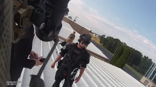Graphic bodycam footage has captured Secret Service and law enforcement officers standing over the body of the gunman who shot at Donald Trump