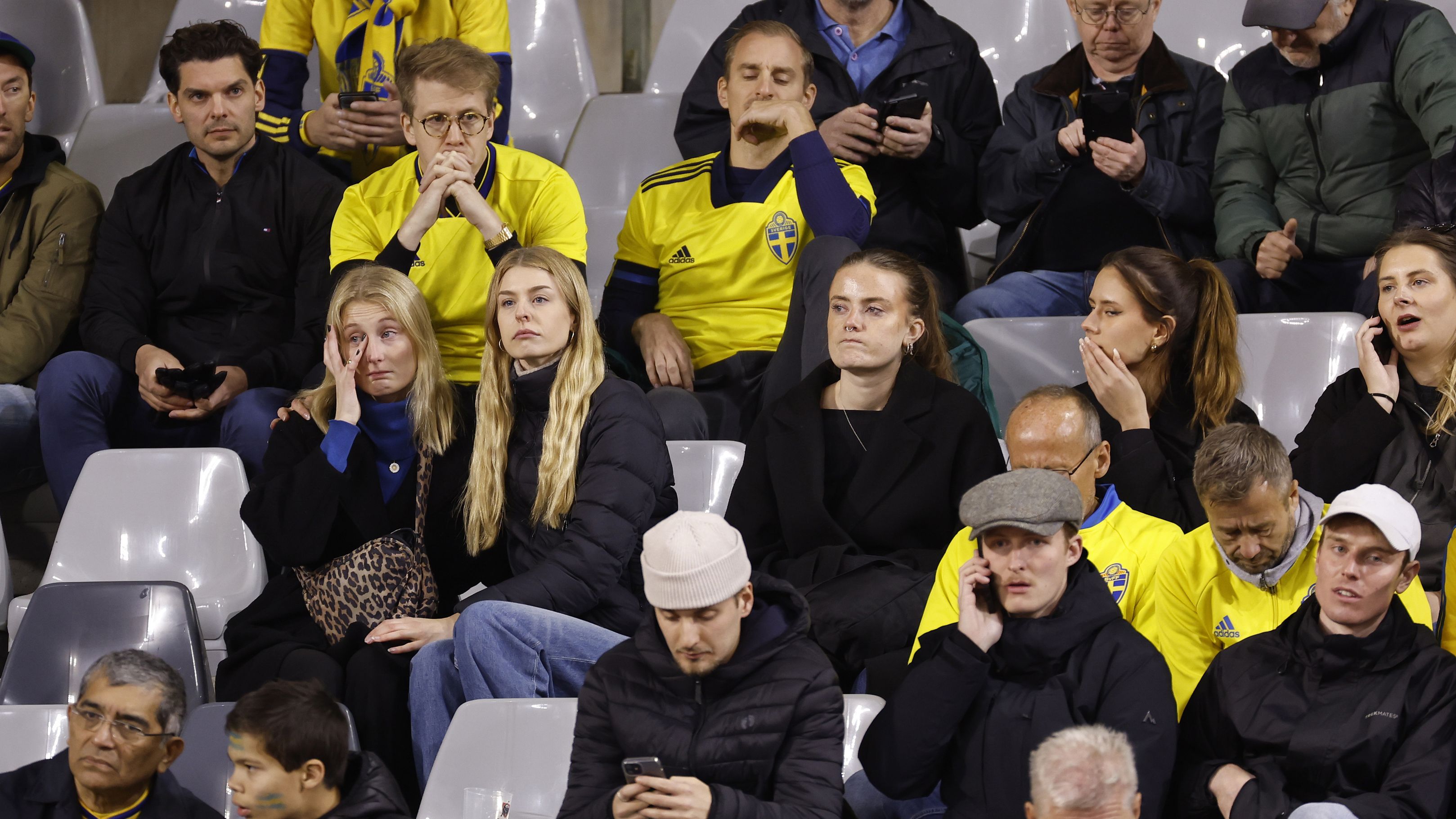 Sweden supporters sit in the stands at King Baudouin Stadium in Brussels.