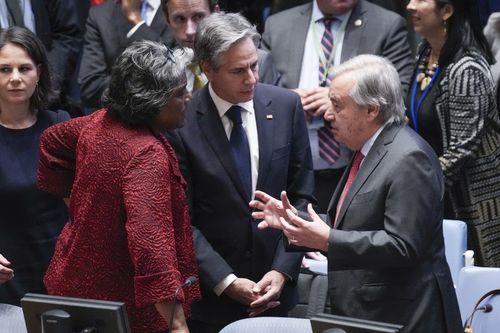 US Secretary of State Antony Blinken, centre, and US Ambassador to the United Nations Linda Thomas-Greenfield, left, talk with UN Secretary-General Antonio Guterres before a Security Council meeting at United Nations headquarters, Tuesday, Oct. 24, 2023 