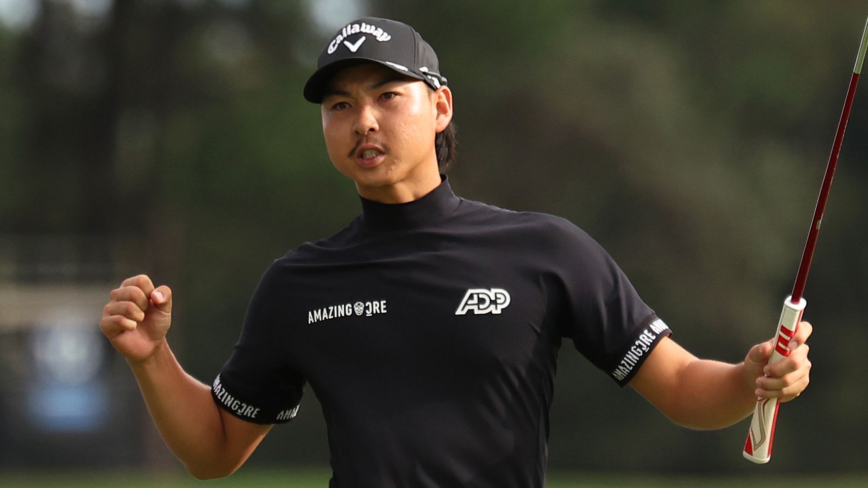 Min Woo Lee of Australia celebrates making a Birdie on the 18th green during the ISPS HANDA Australian Open at The Australian Golf Course on December 02, 2023 in Sydney, Australia. (Photo by Matt King/Getty Images)